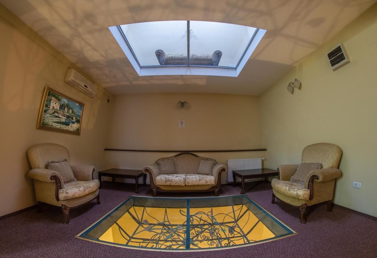 Отель Atrium Hotel Ateneu City Center Бухарест